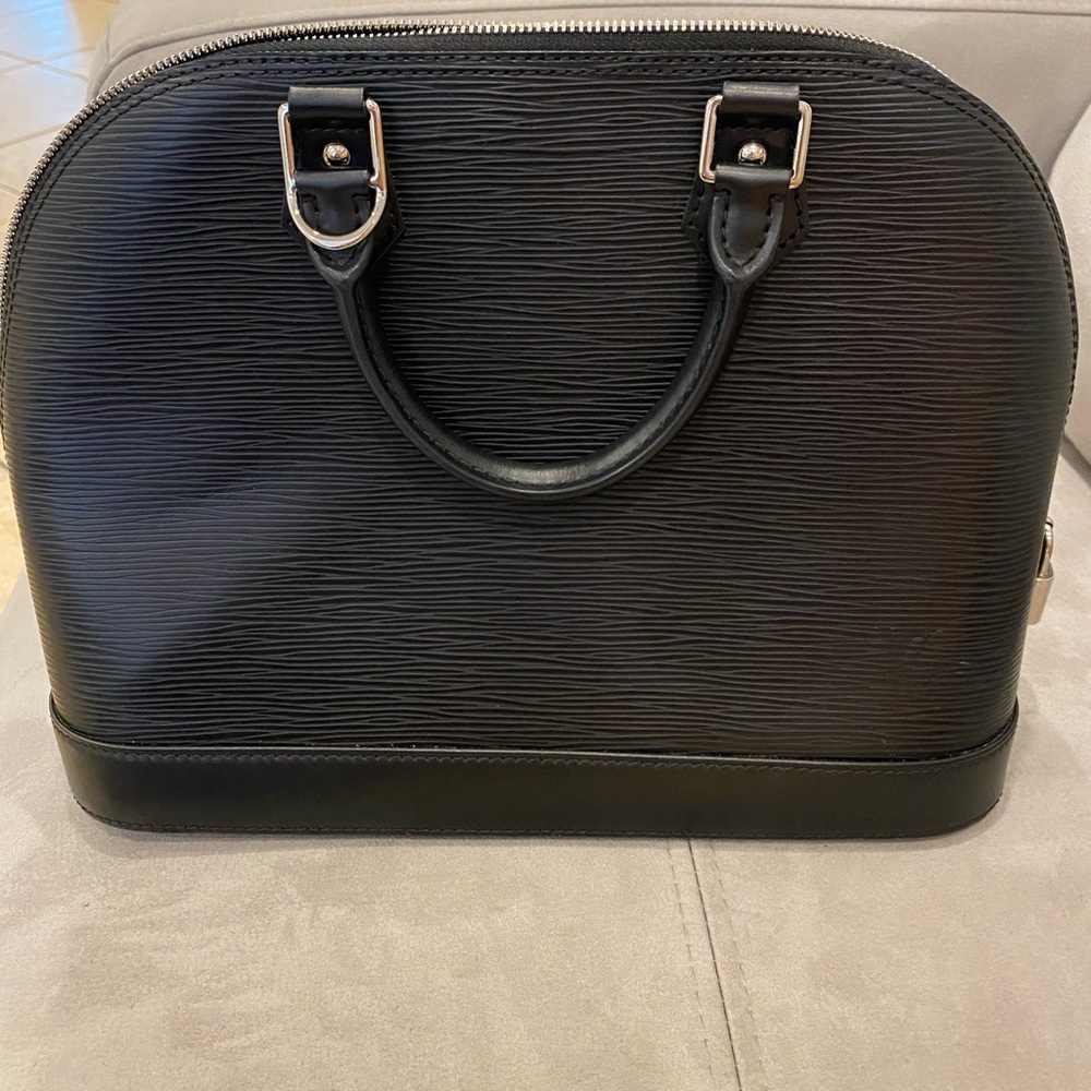 Louis Vuitton alma pm satchel
